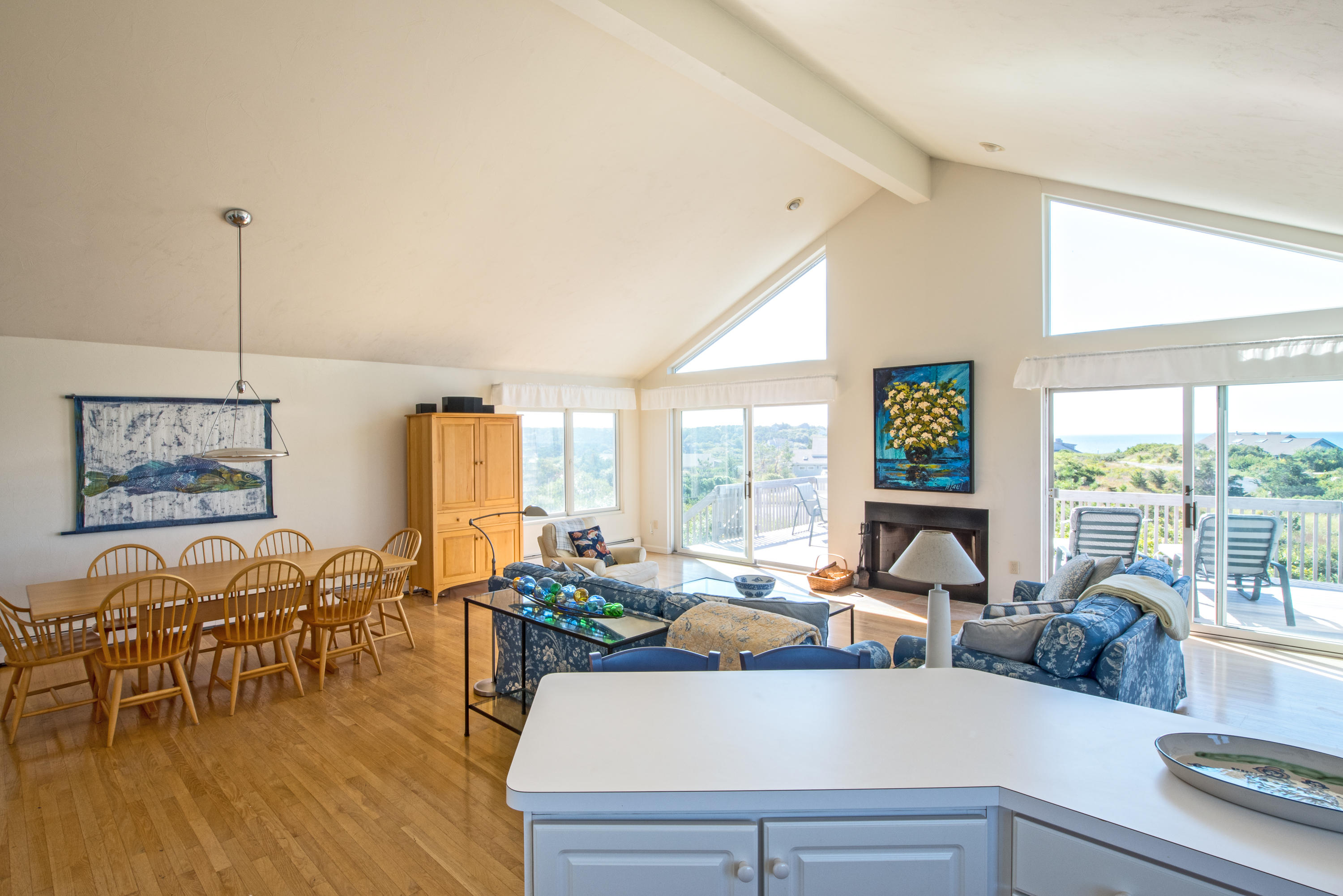 13 Avocet Road Truro, MA 02666 - Photo 12 of 35 a living room with furniture and a large window