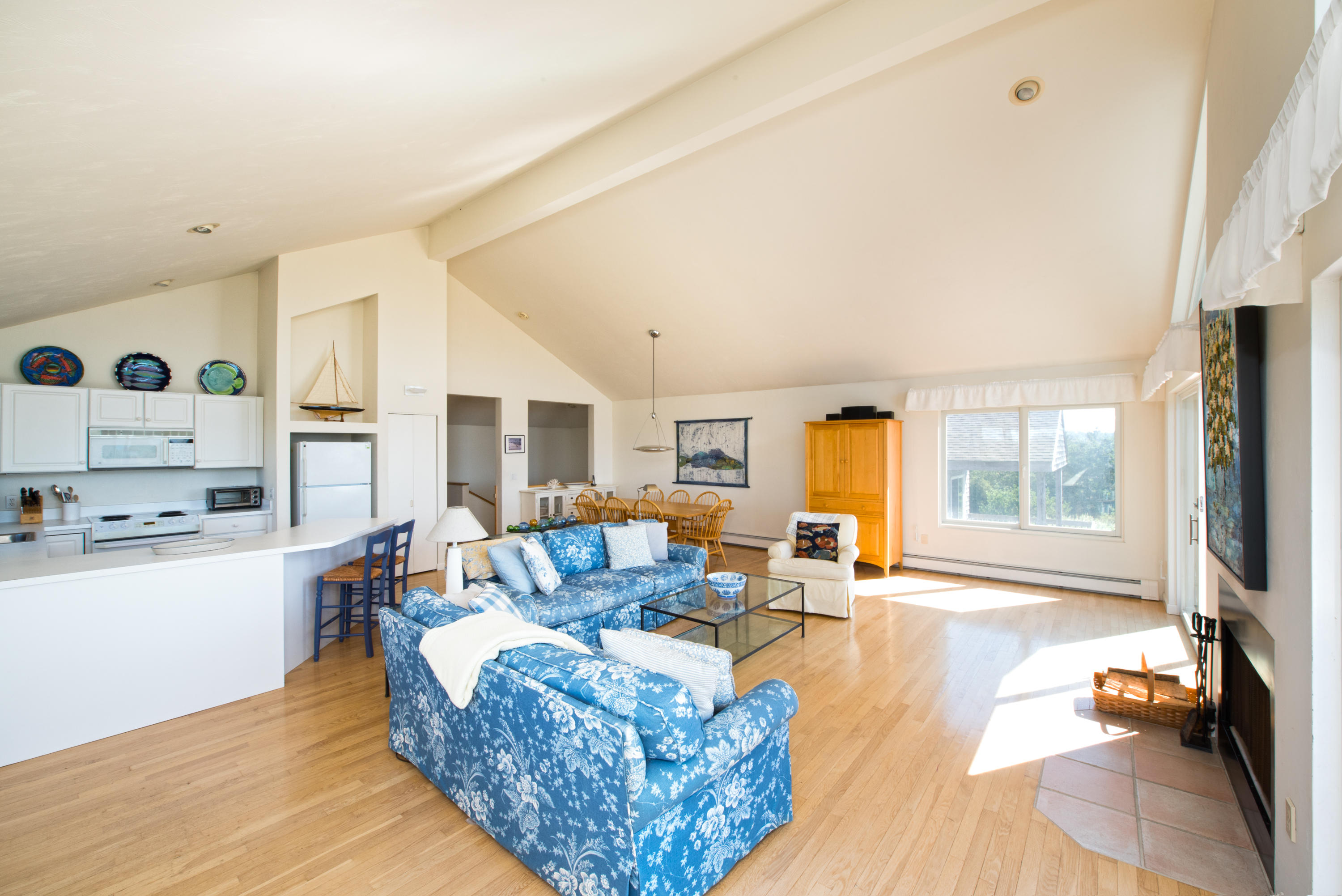 13 Avocet Road Truro, MA 02666 - Photo 13 of 35 a living room with furniture large window and flat screen tv