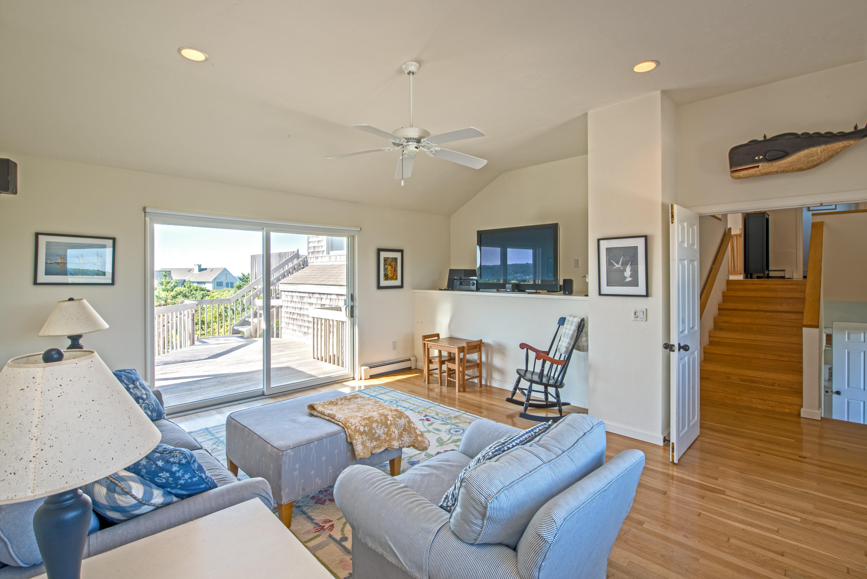 13 Avocet Road Truro, MA 02666 - Photo 20 of 35 a living room with furniture and a wooden floor
