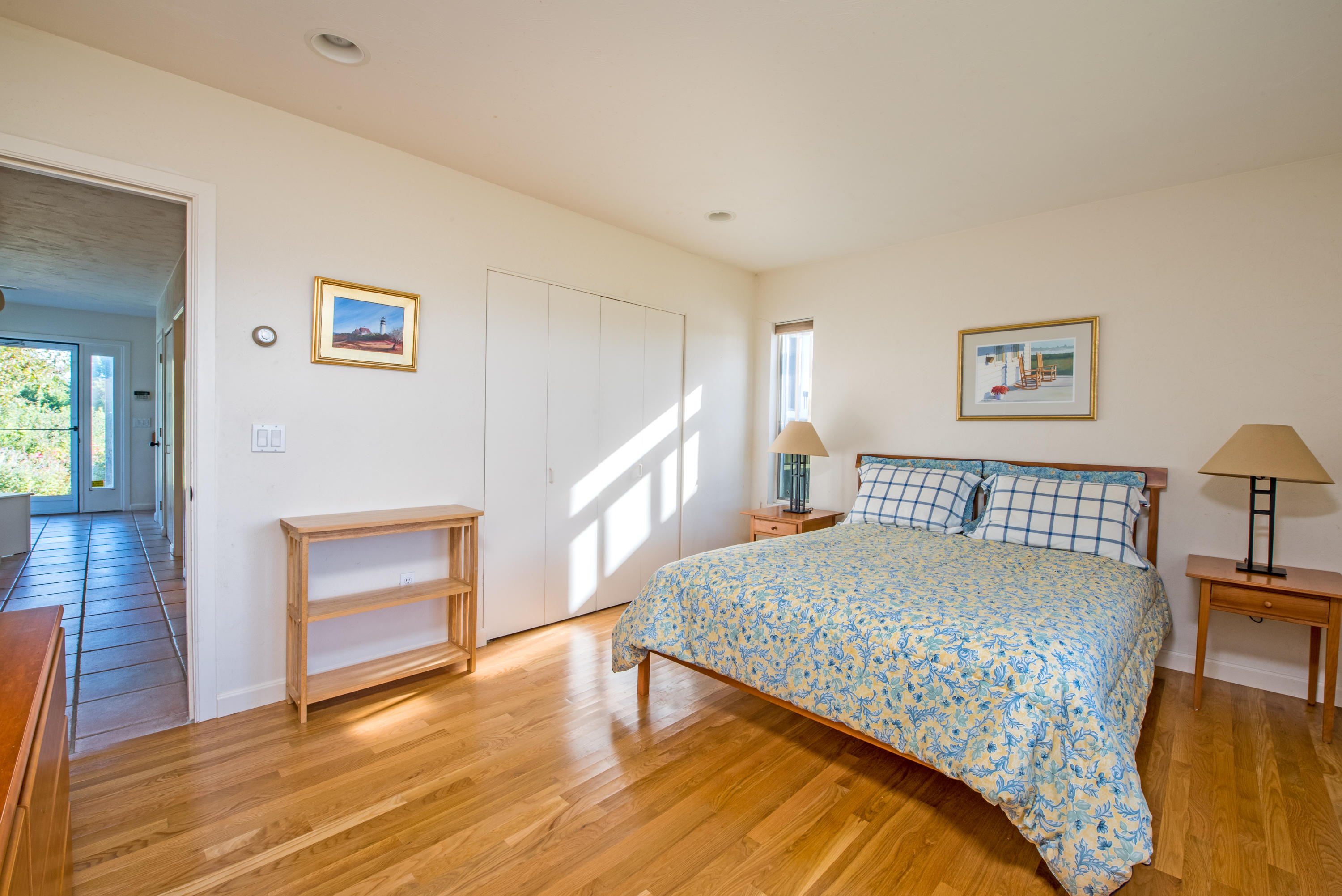 13 Avocet Road Truro, MA 02666 - Photo 22 of 35 a bedroom with a bed and a view of kitchen