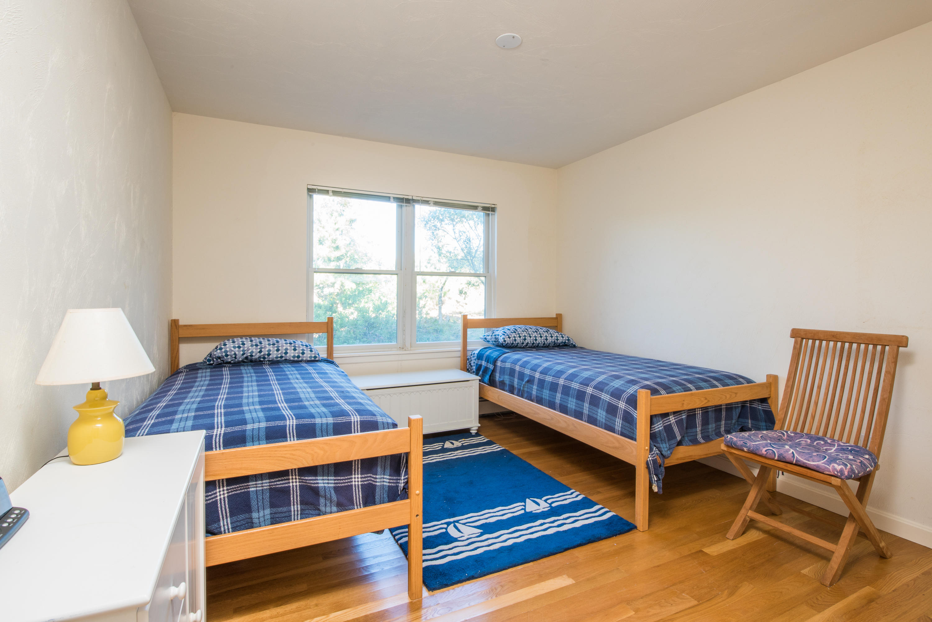 13 Avocet Road Truro, MA 02666 - Photo 24 of 35 a bedroom with a bed and a desk