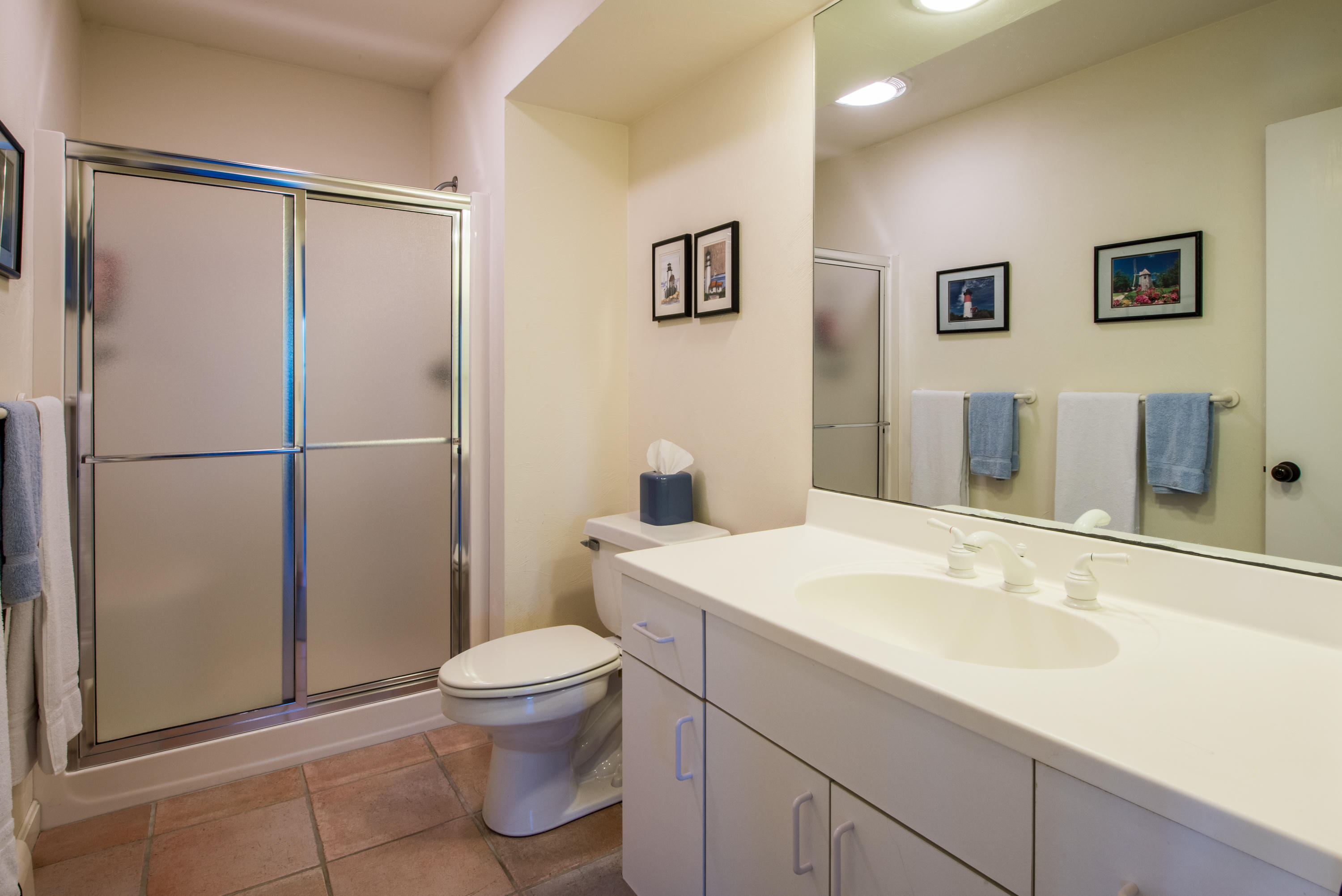 13 Avocet Road Truro, MA 02666 - Photo 26 of 35 a bathroom with a sink toilet and shower
