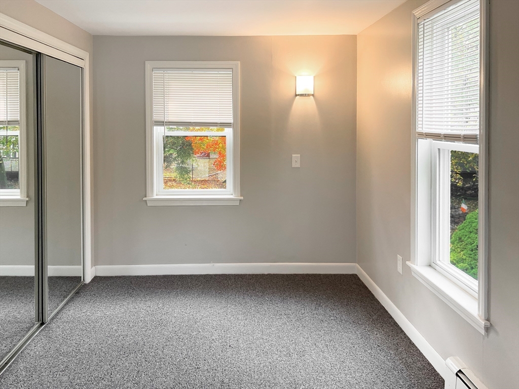26 Wheeler Avenue, Unit 1 Rockland, MA 02370 - Photo 11 of 16 an empty room with a window