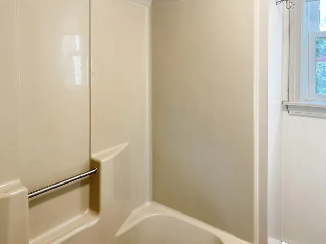 a bathroom with a bathtub
