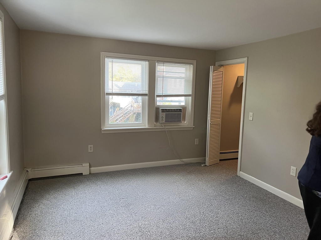 26 Wheeler Avenue, Unit 1 Rockland, MA 02370 - Photo 15 of 16 an empty room with windows
