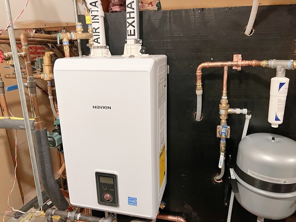 26 Wheeler Avenue, Unit 1 Rockland, MA 02370 - Photo 16 of 16 a utility room with dryer and washer