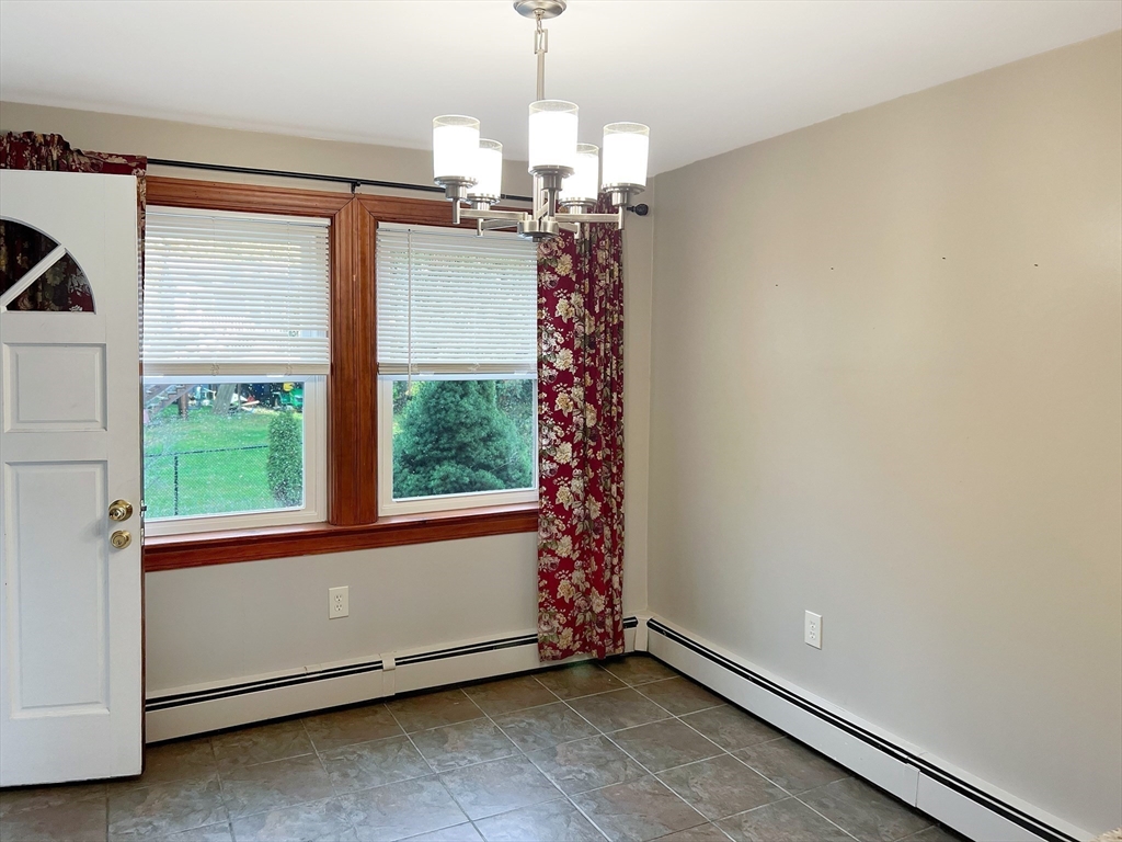 26 Wheeler Avenue, Unit 1 Rockland, MA 02370 - Photo 5 of 16 a very nice looking room with a window
