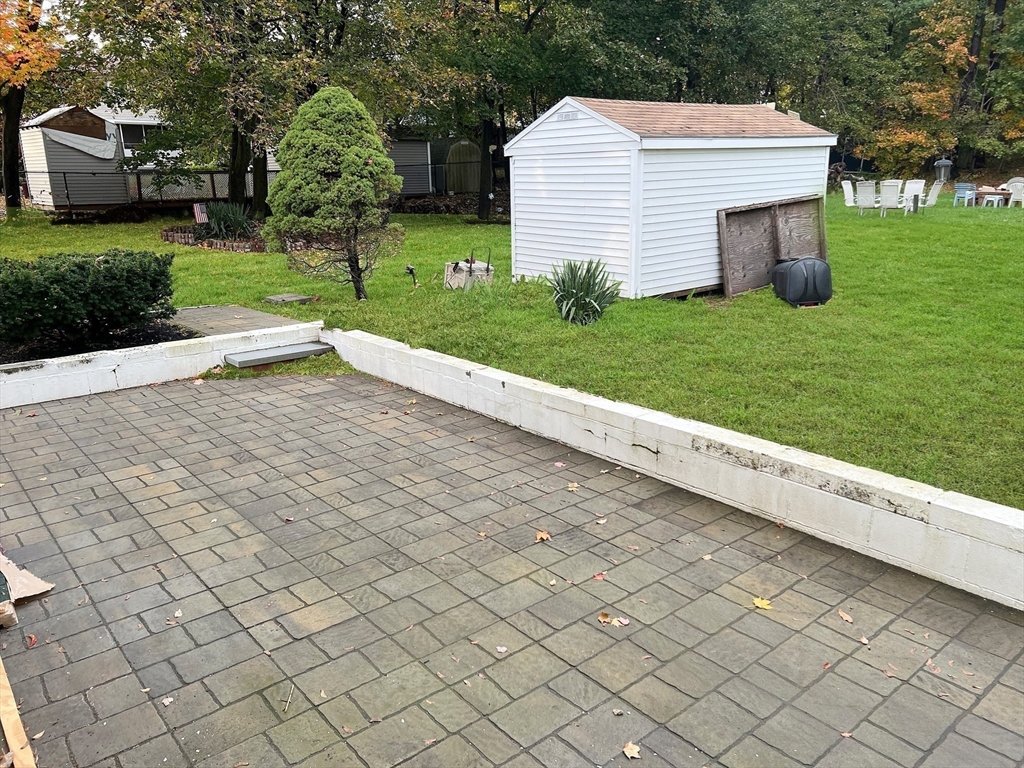26 Wheeler Avenue, Unit 1 Rockland, MA 02370 - Photo 8 of 16 a view of a backyard of the house