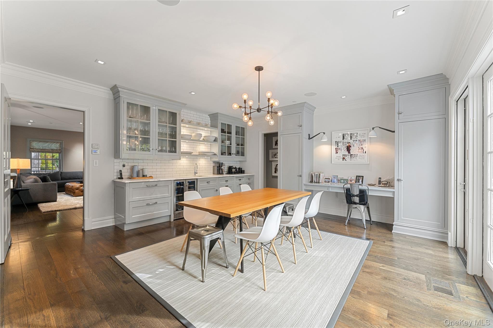 8 Richbell Road Scarsdale, NY 10583 - Photo 17 of 45 a view of a dining room with furniture and wooden floor
