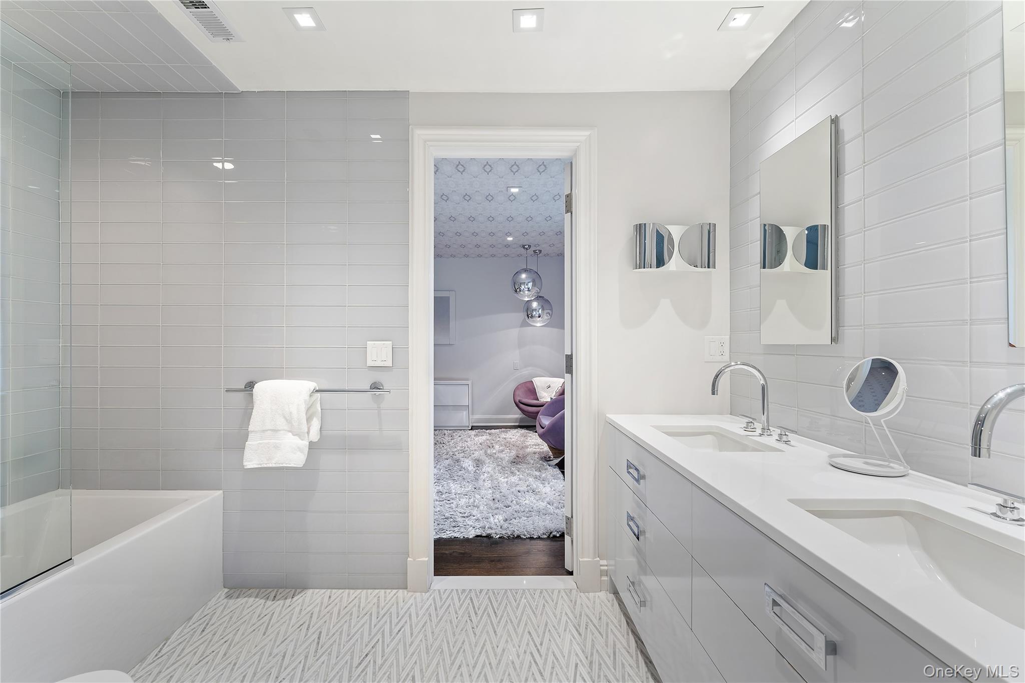 8 Richbell Road Scarsdale, NY 10583 - Photo 33 of 45 a bathroom with a tub sink and mirror