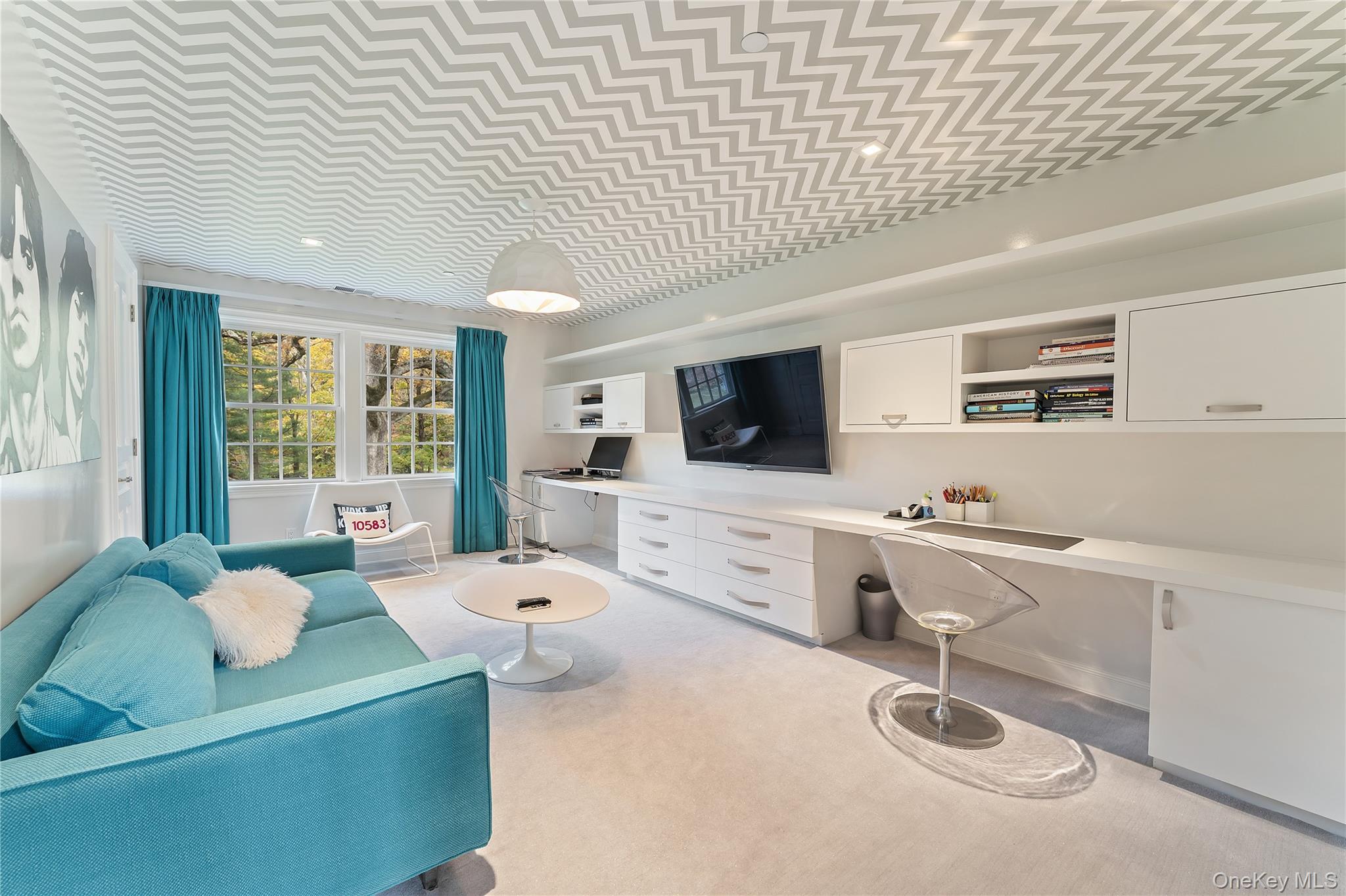 8 Richbell Road Scarsdale, NY 10583 - Photo 34 of 45 a room with furniture and flat screen tv