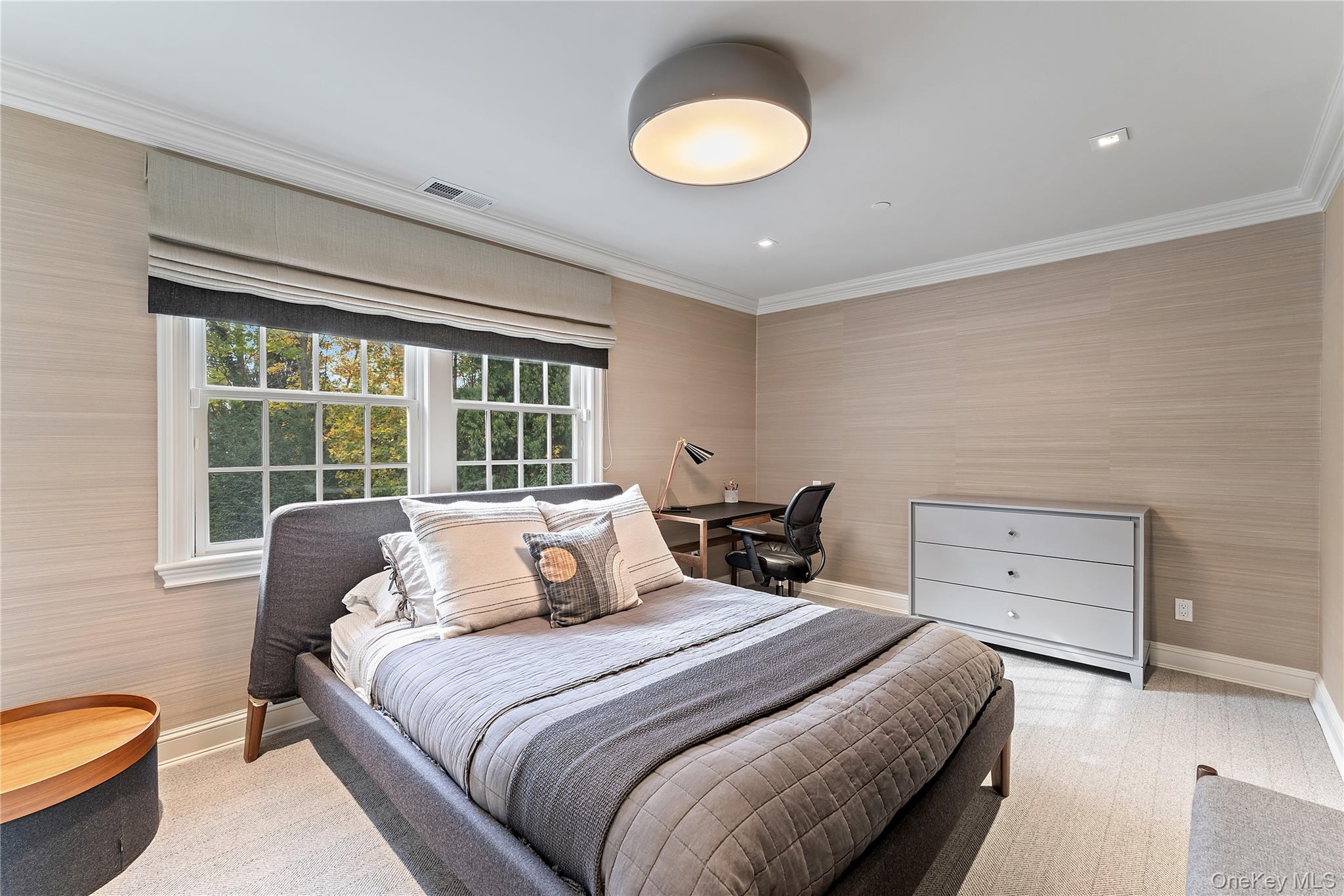 8 Richbell Road Scarsdale, NY 10583 - Photo 35 of 45 a bedroom with a bed and a chair