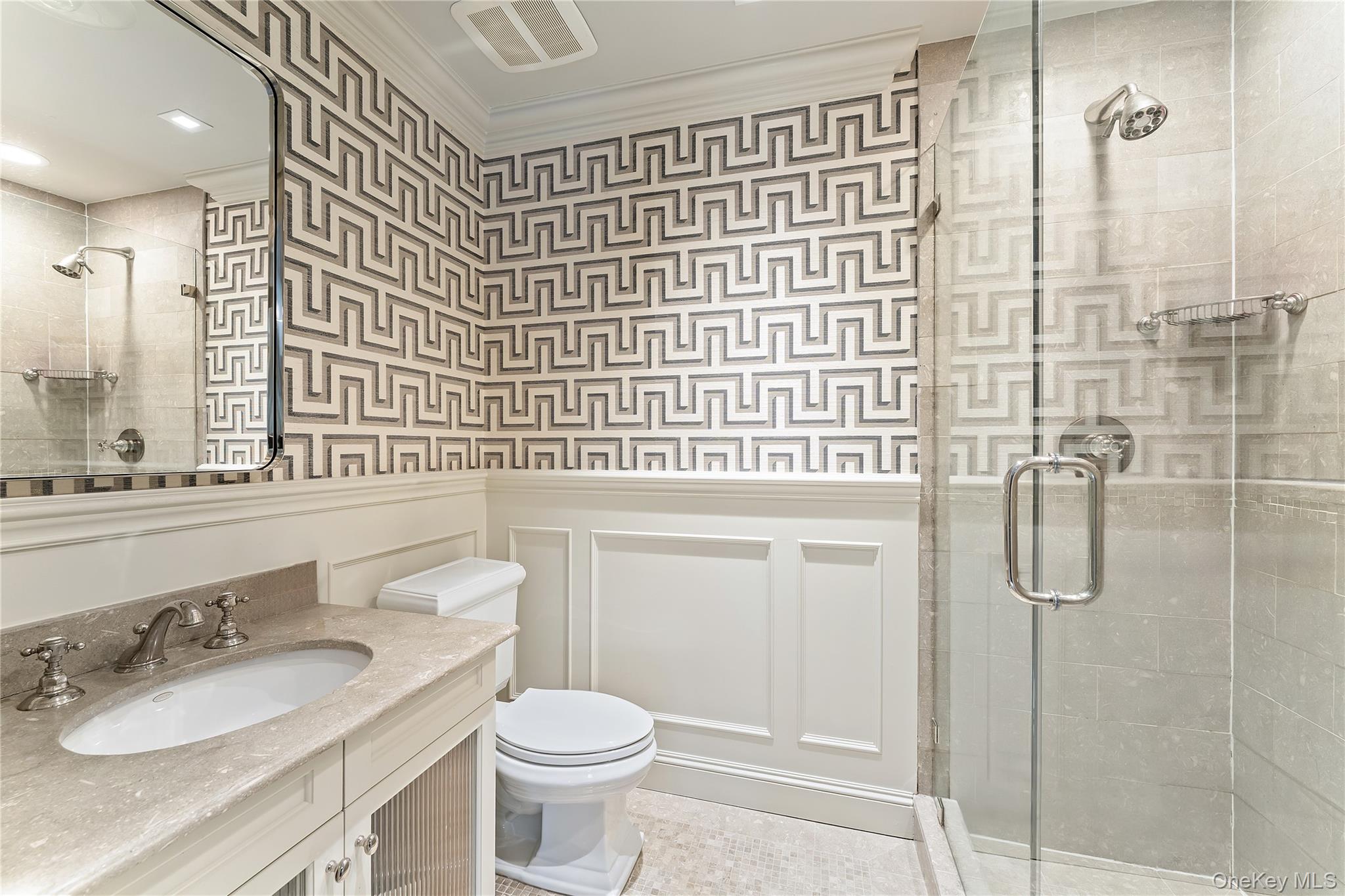 8 Richbell Road Scarsdale, NY 10583 - Photo 36 of 45 a bathroom with a granite countertop sink a toilet a mirror and shower