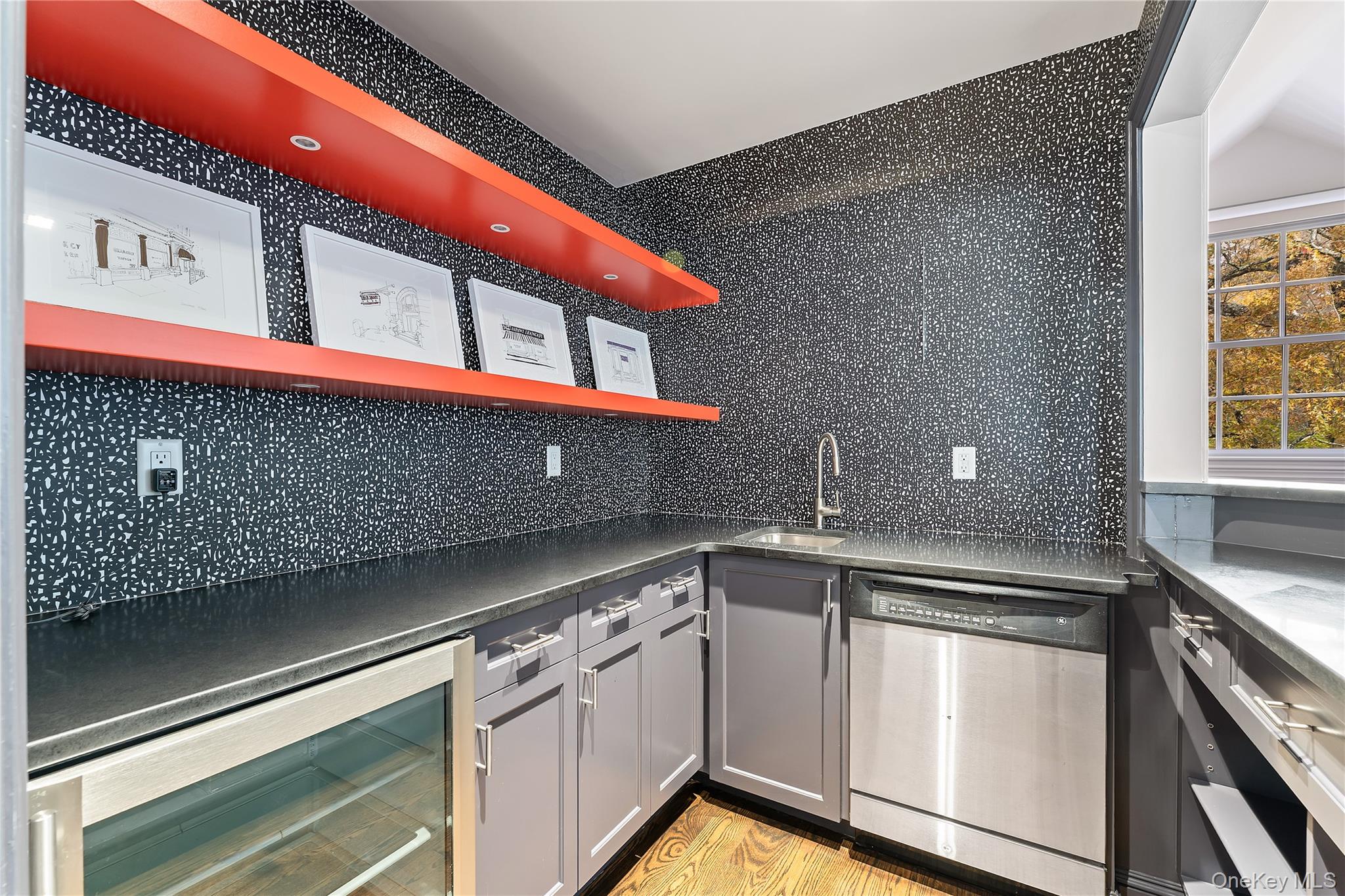 8 Richbell Road Scarsdale, NY 10583 - Photo 39 of 45 a kitchen with stainless steel appliances granite countertop a sink and wooden cabinets