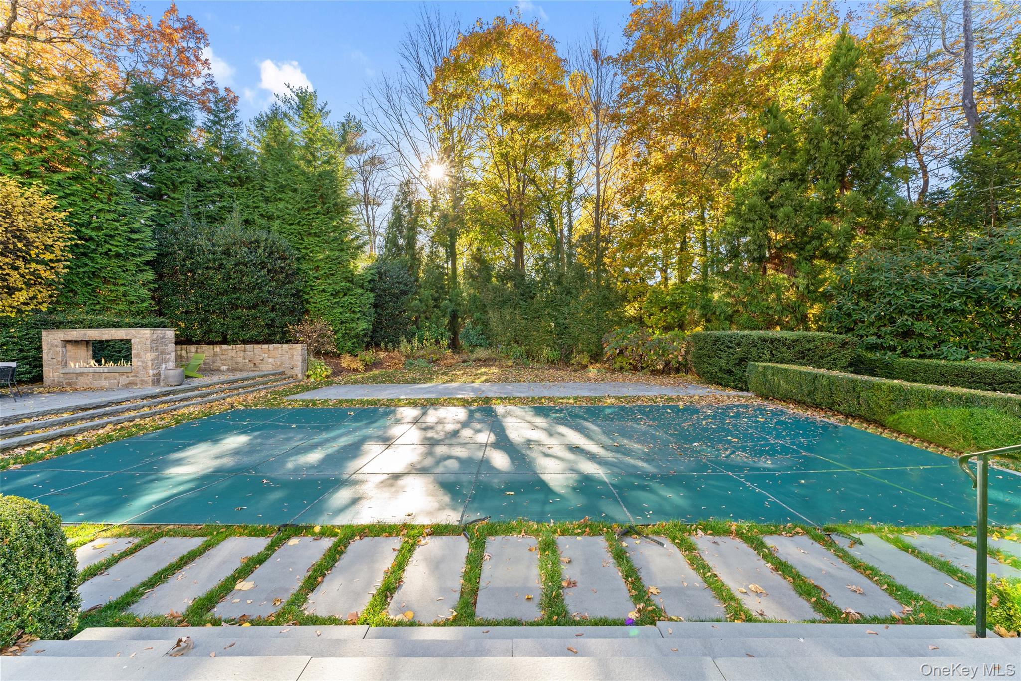 8 Richbell Road Scarsdale, NY 10583 - Photo 10 of 45 a view of backyard with swimming pool