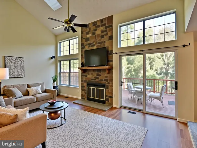a kitchen with stainless steel appliances granite countertop a refrigerator sink and stove