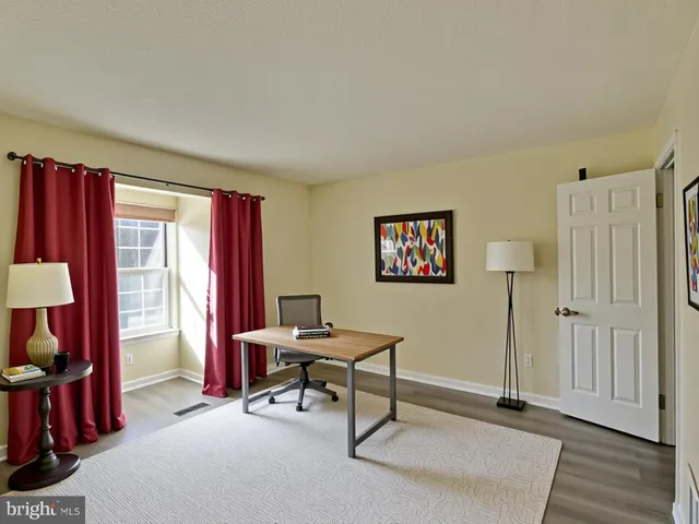 a bathroom with a shower and a toilet