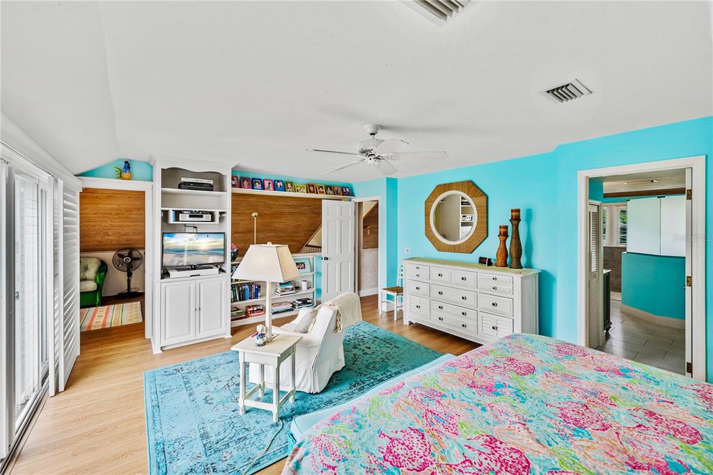 12 Seawatch Drive Boca Grande, FL 33921 - Photo 32 of 54 a bedroom with furniture and a wooden floor