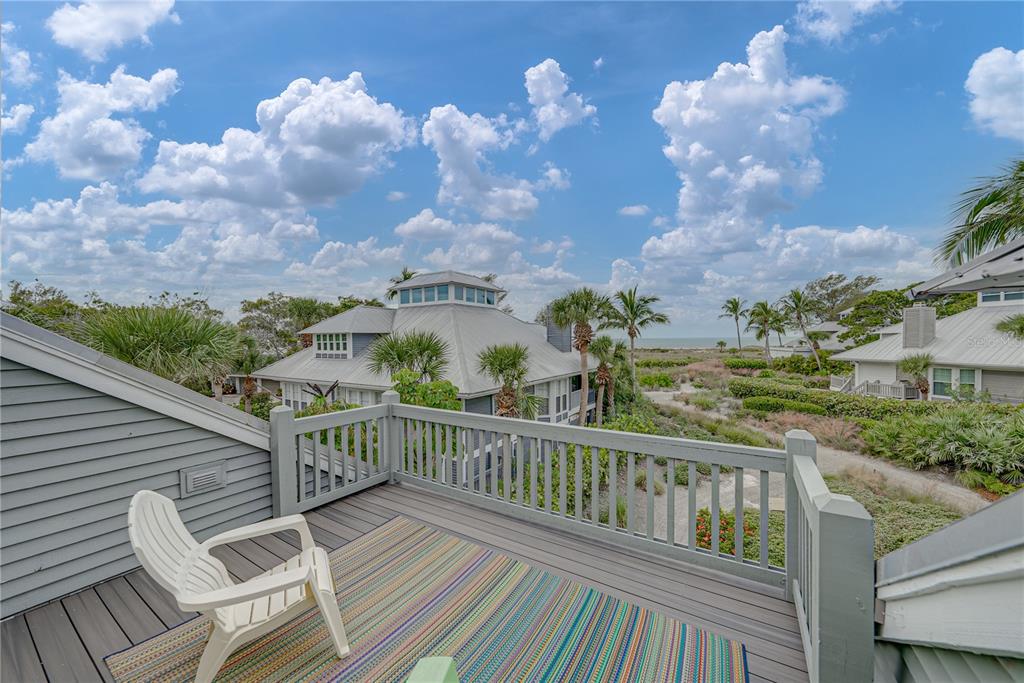 12 Seawatch Drive Boca Grande, FL 33921 - Photo 43 of 54 a view of a balcony with wooden floor