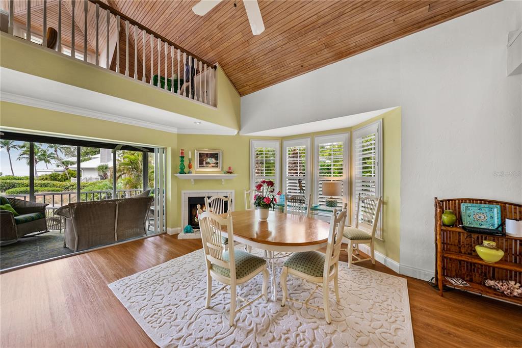 12 Seawatch Drive Boca Grande, FL 33921 - Photo 5 of 54 a dining room with furniture wooden floor and a rug