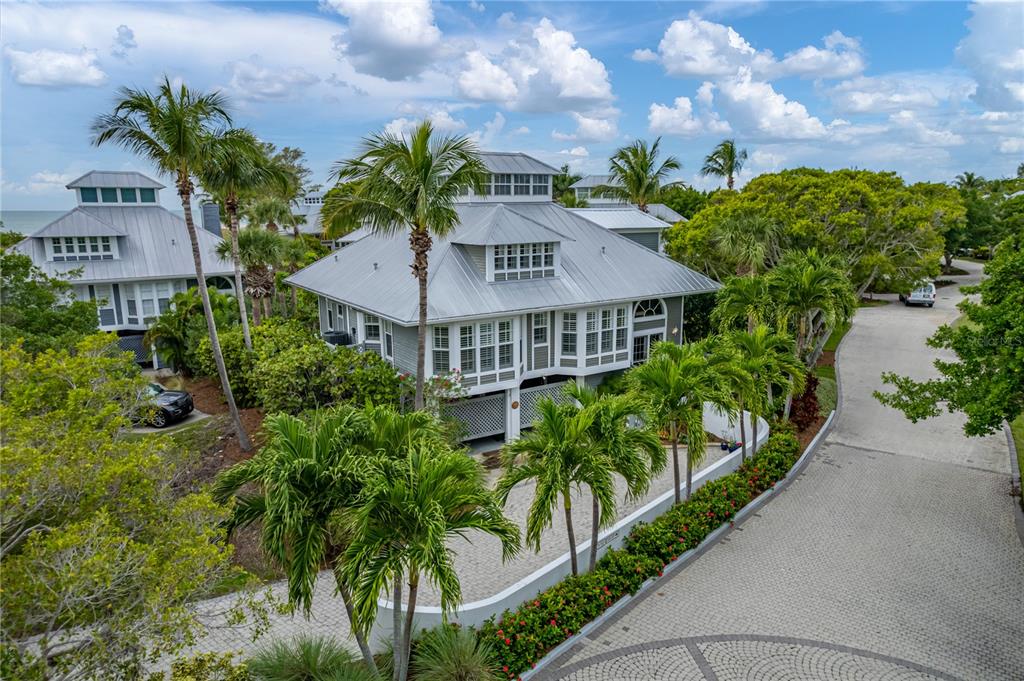 12 Seawatch Drive Boca Grande, FL 33921 - Photo 51 of 54 a view of a house with a yard and potted plants