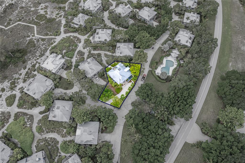 12 Seawatch Drive Boca Grande, FL 33921 - Photo 54 of 54 an aerial view of a house with a backyard