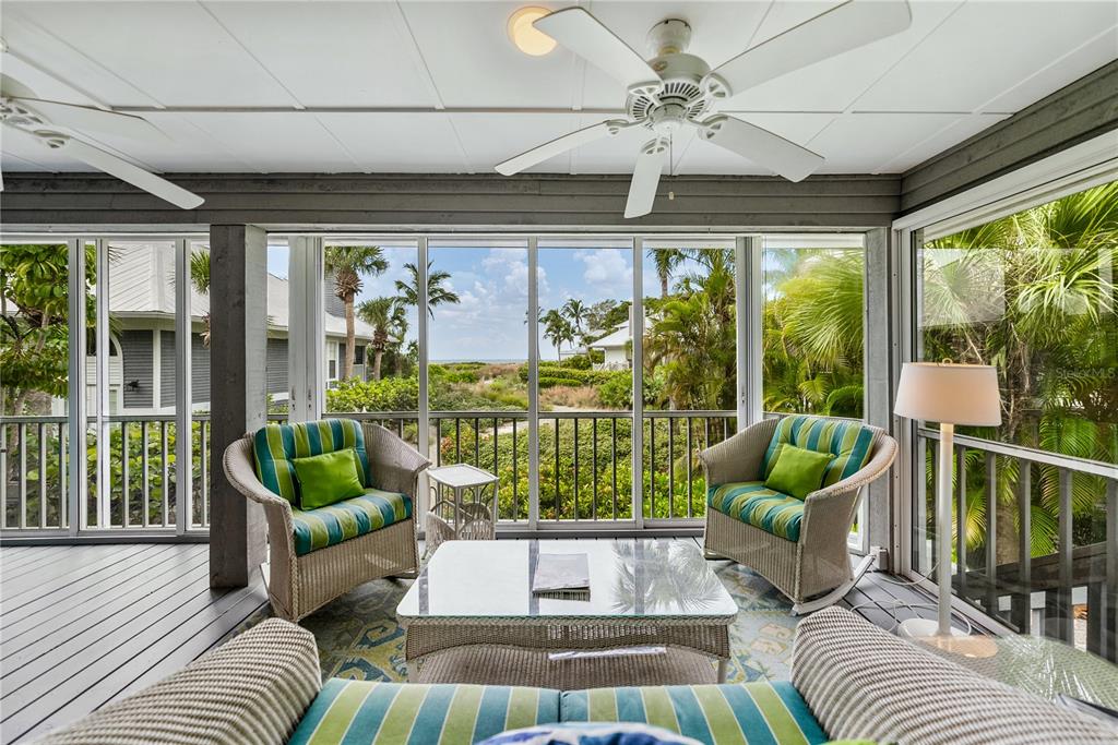 12 Seawatch Drive Boca Grande, FL 33921 - Photo 8 of 54 a living room with furniture and a large window