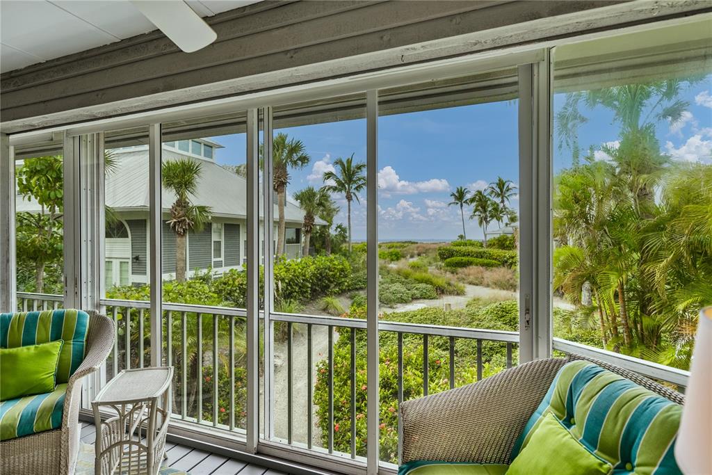 12 Seawatch Drive Boca Grande, FL 33921 - Photo 10 of 54 a view of a porch with furniture