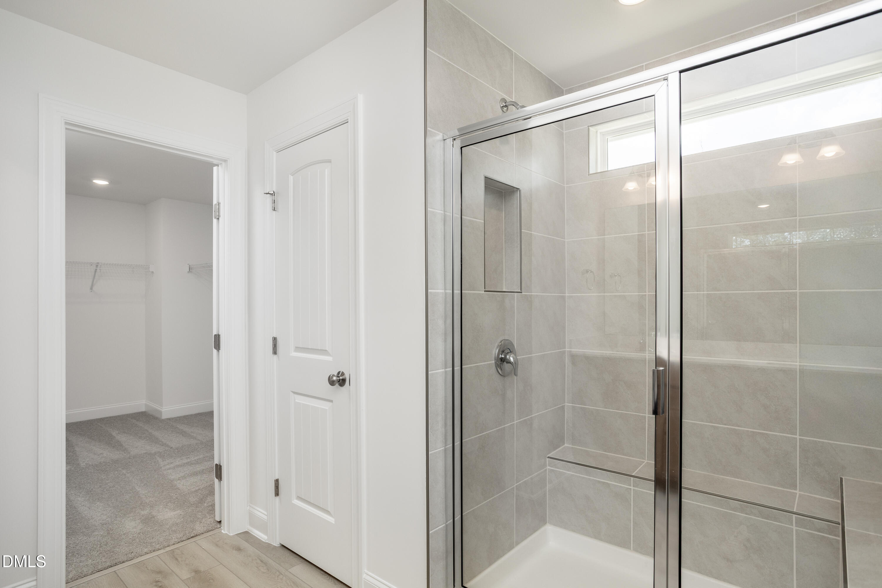 216 Cedar Rdg Trail Angier, NC 27501 - Photo 27 of 33 a bathroom with a glass shower door