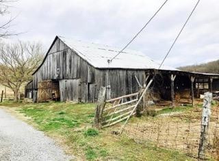415 Corley Road Liberty, TN 37095 - Photo 12 of 19 a view of wooden house with a yard