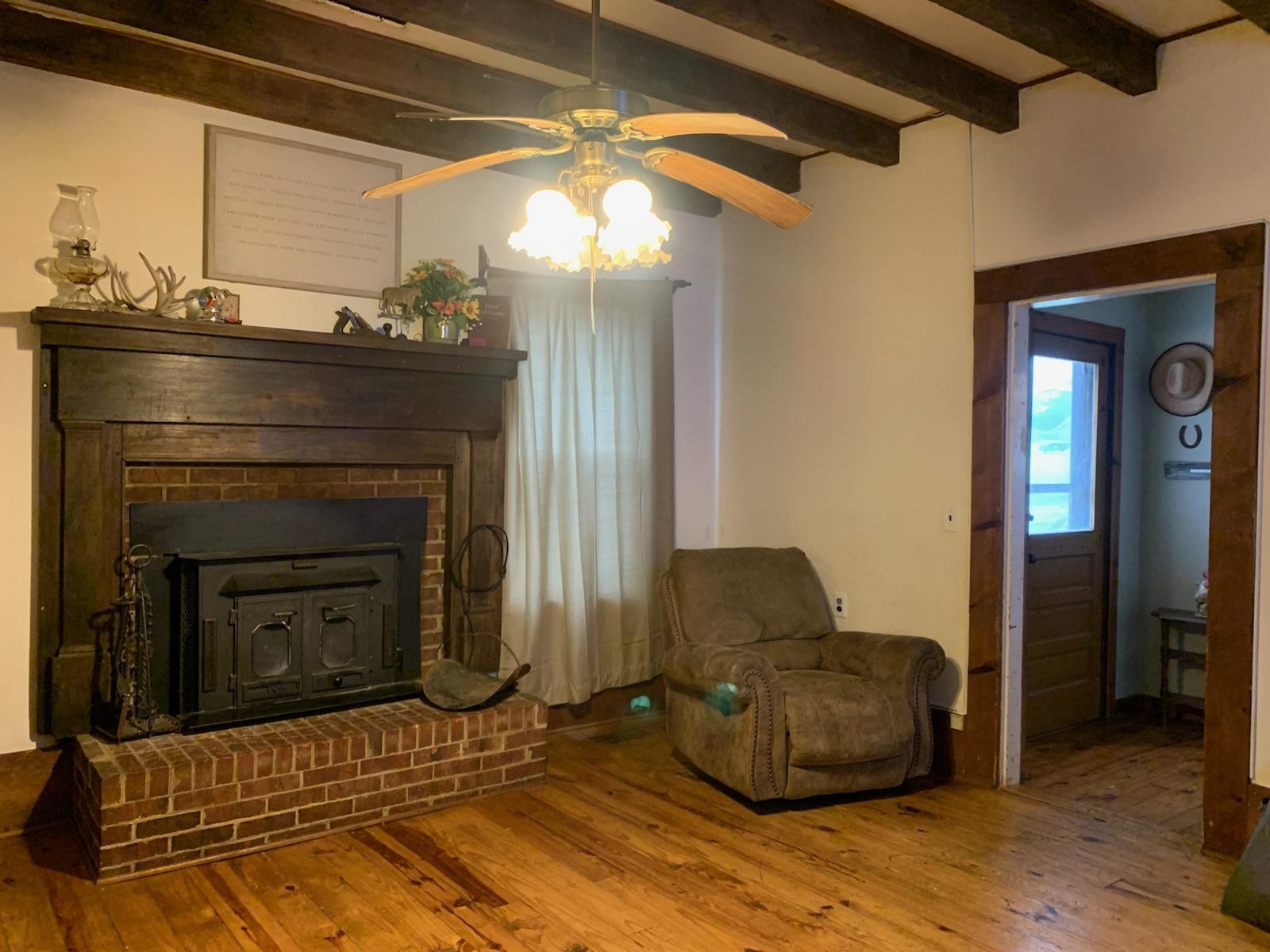 415 Corley Road Liberty, TN 37095 - Photo 5 of 19 a living room with furniture and a fireplace