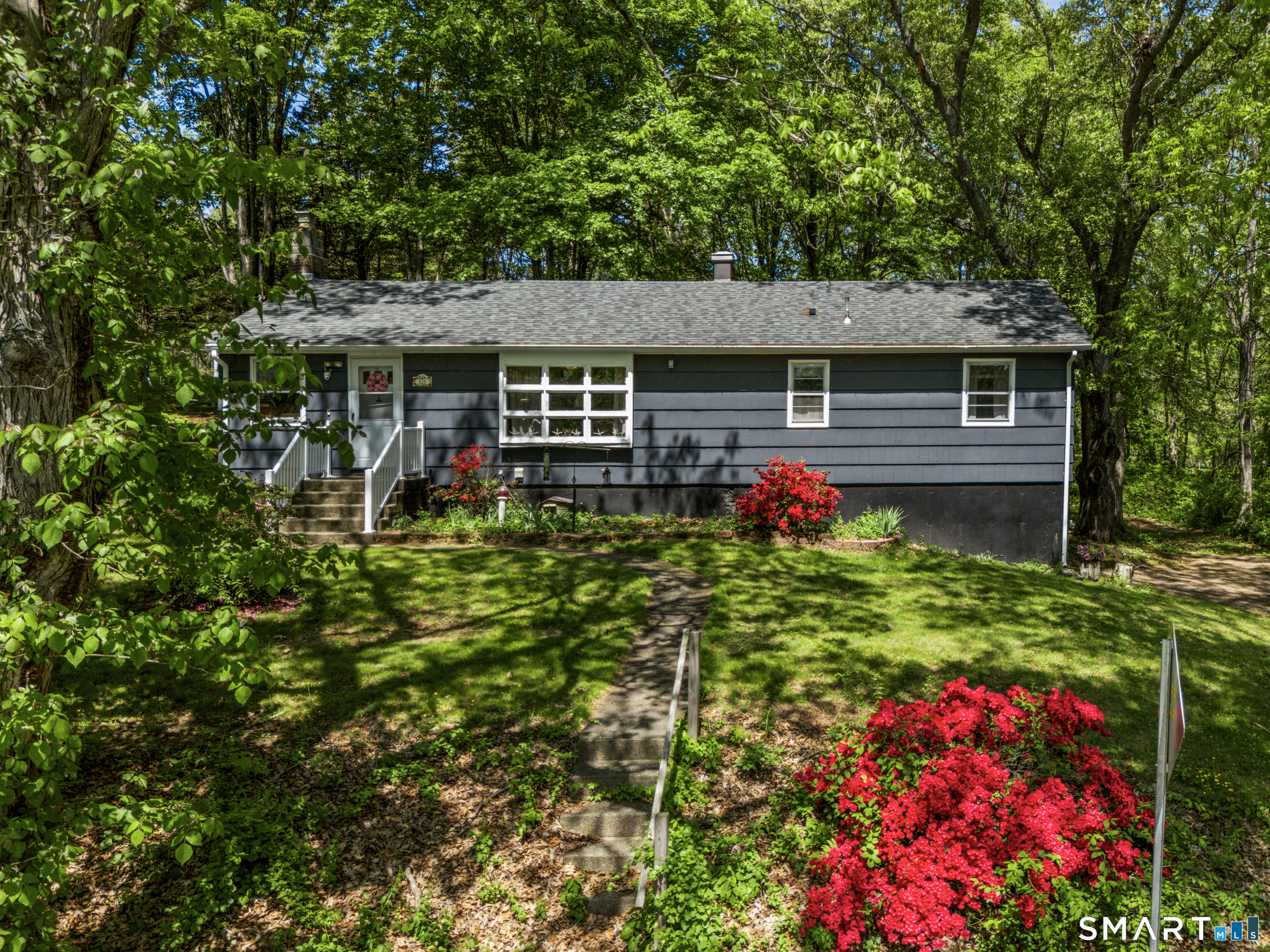 121 River Road Preston, CT 06365 - Photo 2 of 37 front view of a house with a yard