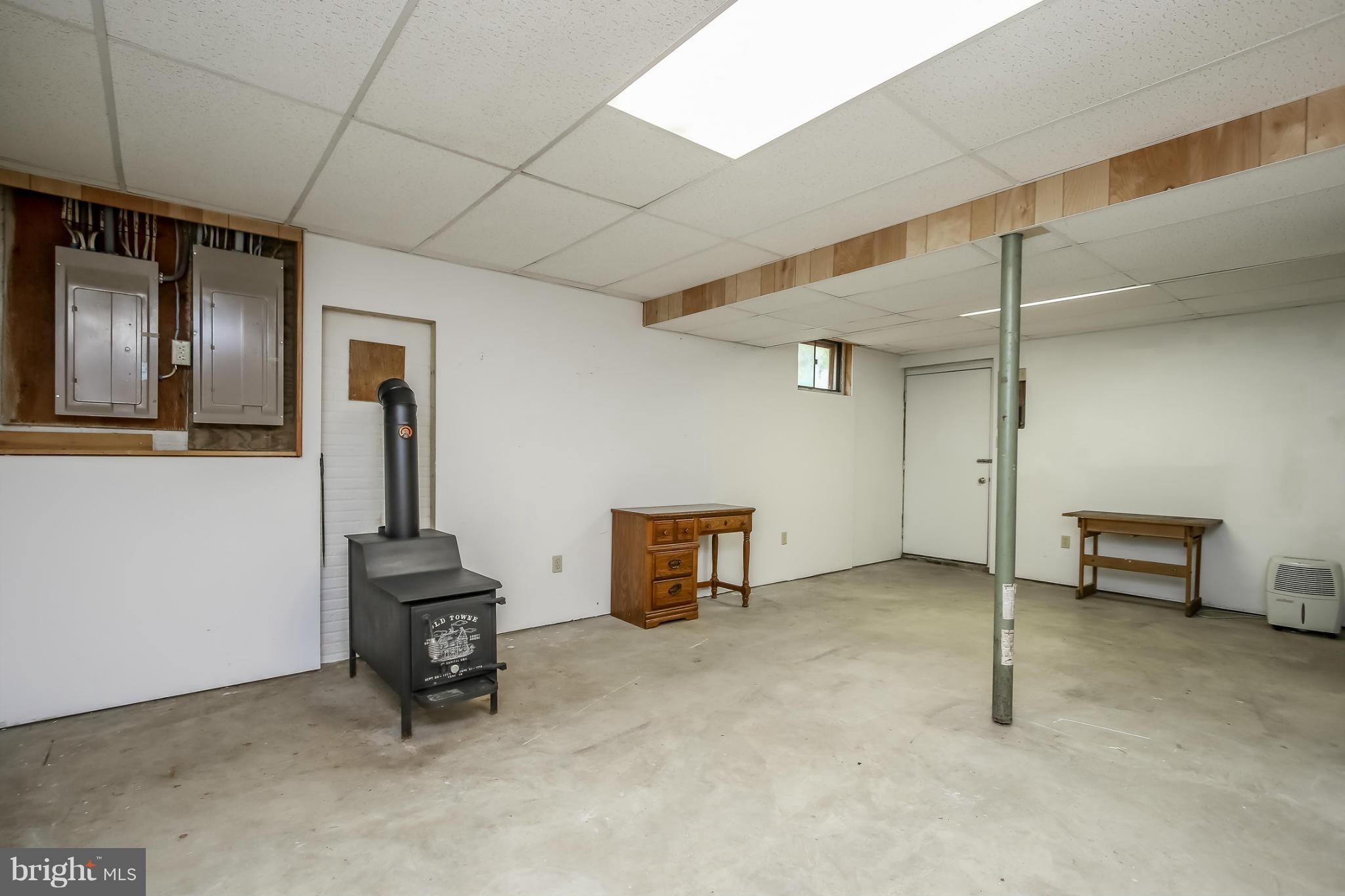 2122 Ebbvale Road Manchester, MD 21102 - Photo 22 of 30 Walk-out Basement. Woodstove stays with house