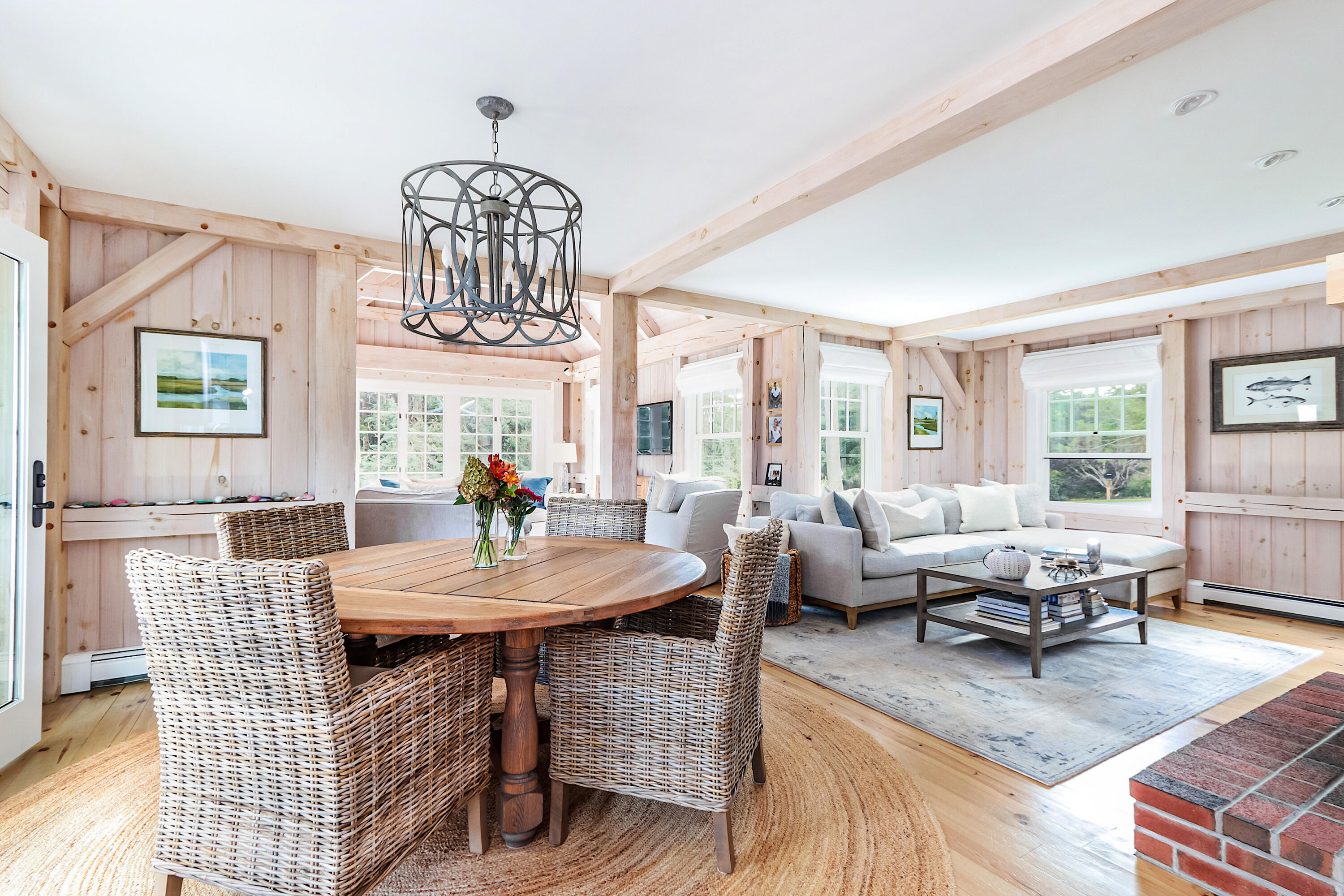 330 Sandy Neck Road West Barnstable, MA 02668 - Photo 12 of 45 a living room with furniture a chandelier and a table