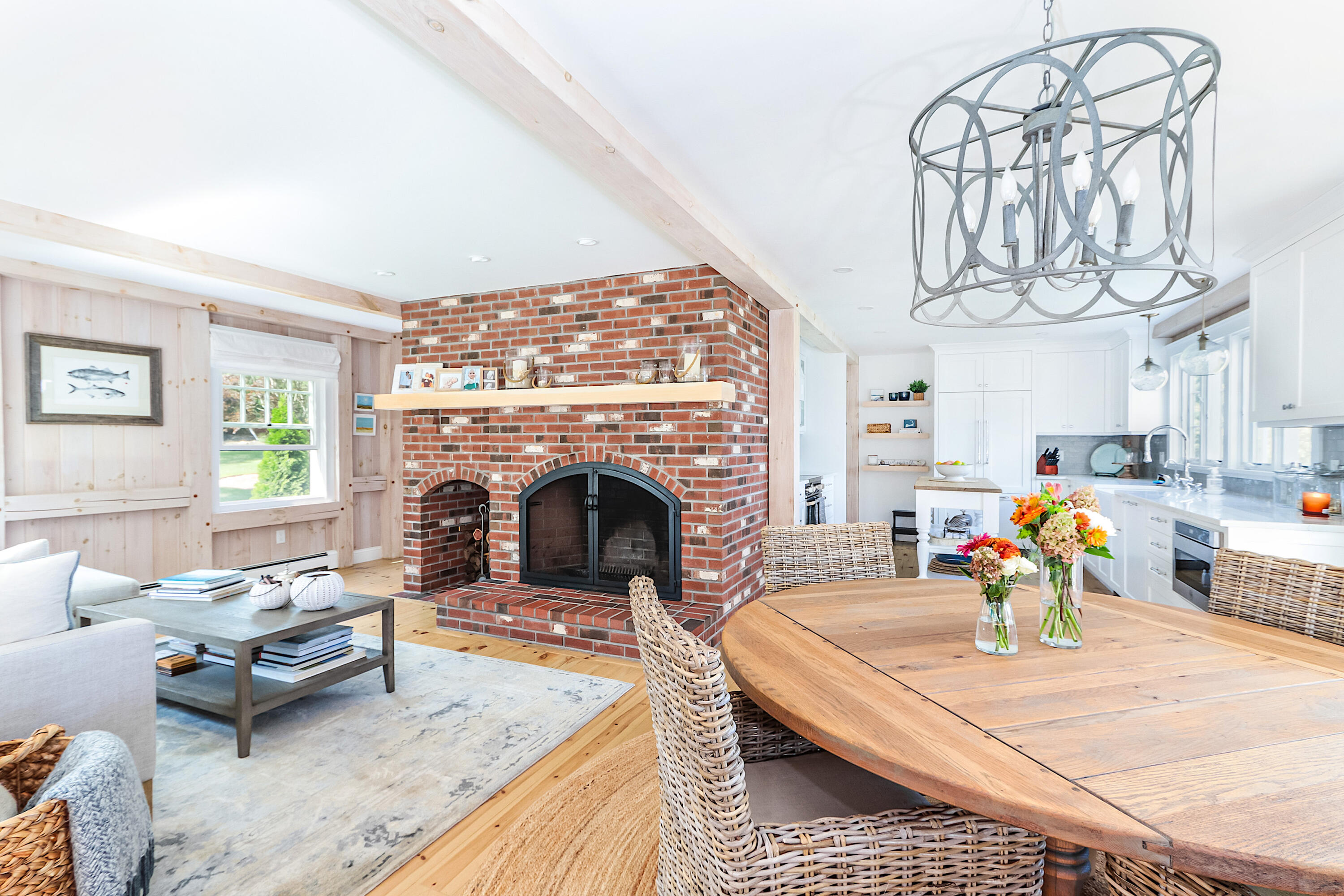 330 Sandy Neck Road West Barnstable, MA 02668 - Photo 13 of 45 a living room with furniture large window and a fireplace