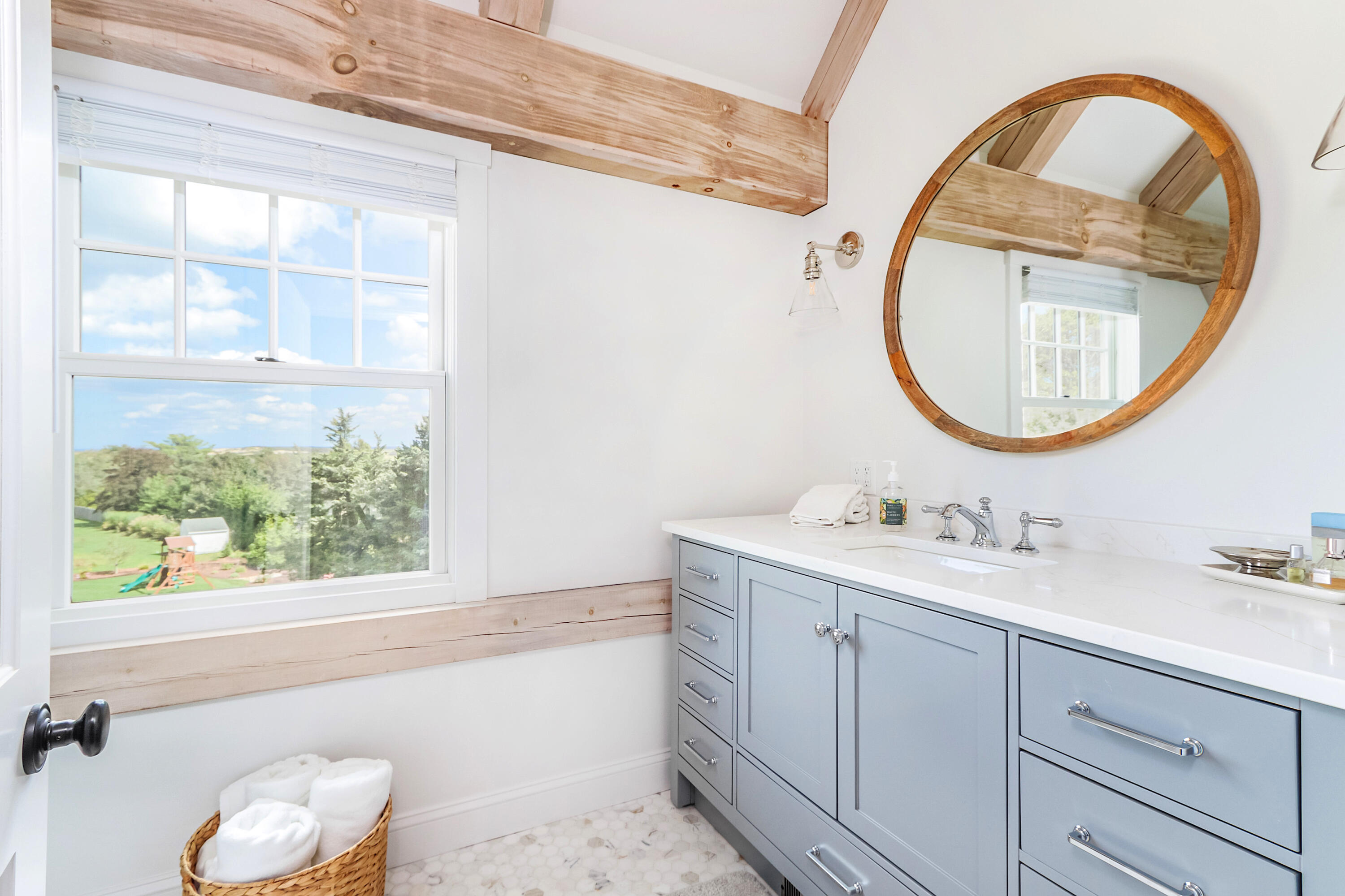 330 Sandy Neck Road West Barnstable, MA 02668 - Photo 26 of 45 a bathroom with a sink and a mirror