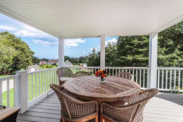 a view of a wooden roof deck