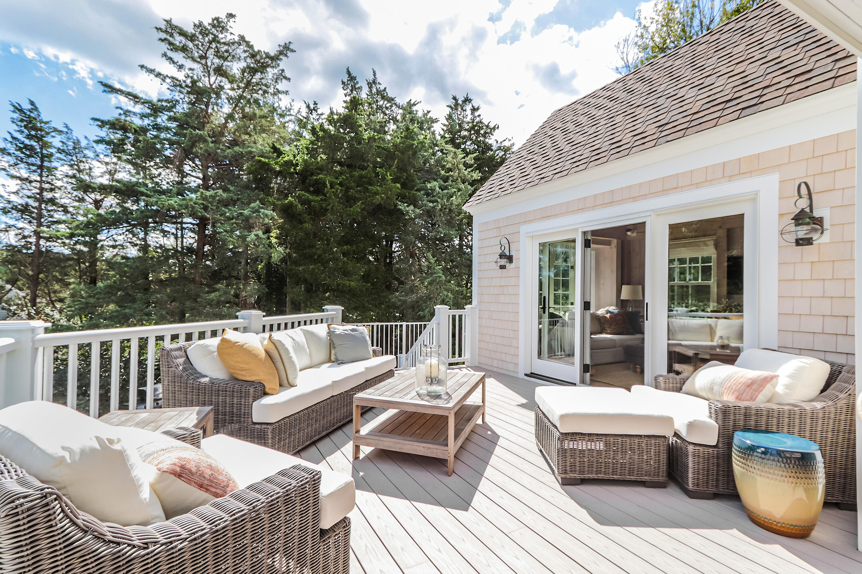 330 Sandy Neck Road West Barnstable, MA 02668 - Photo 32 of 45 a view of a patio with couches chairs and wooden floor