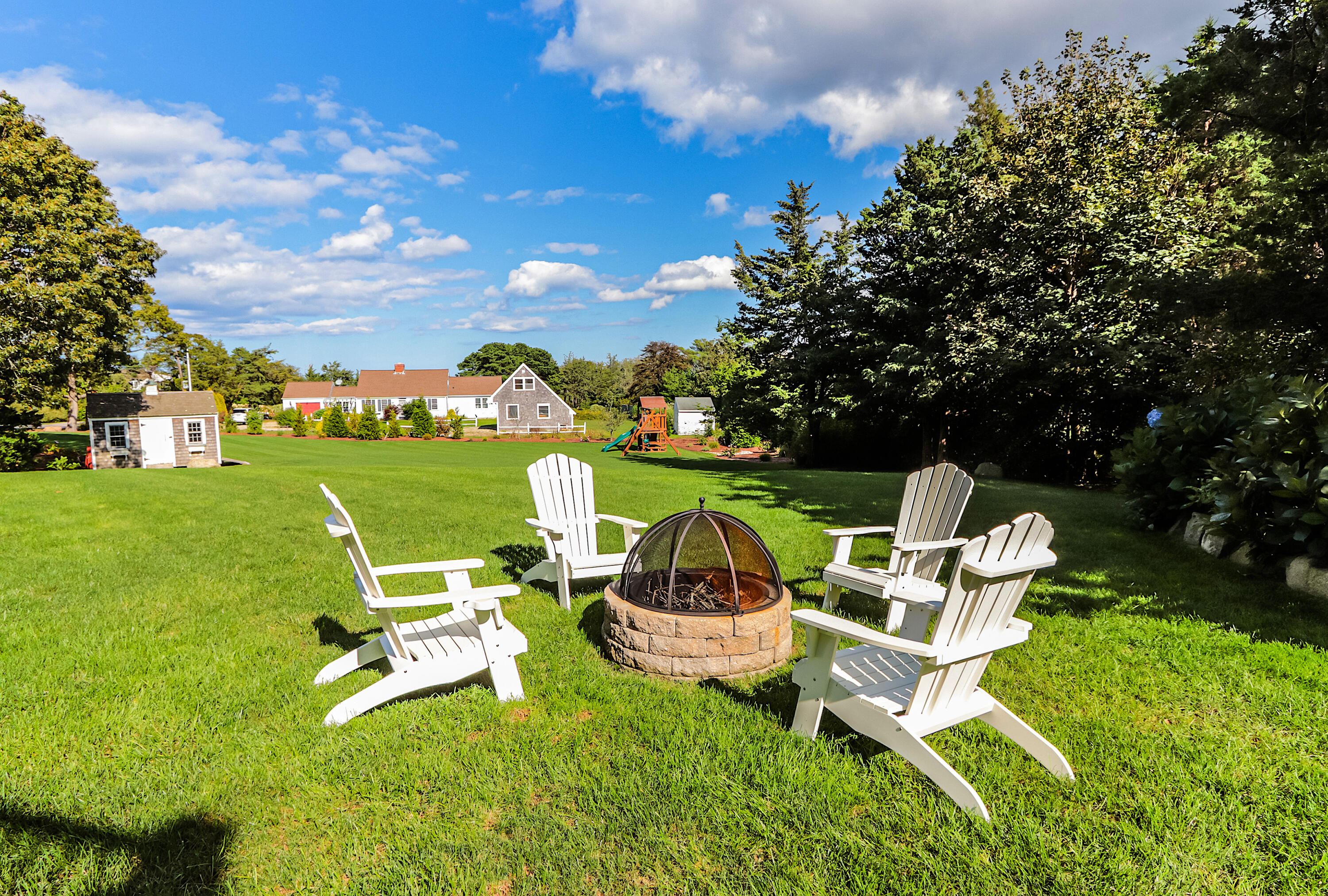 330 Sandy Neck Road West Barnstable, MA 02668 - Photo 37 of 45 a couple of chairs and a table in the garden