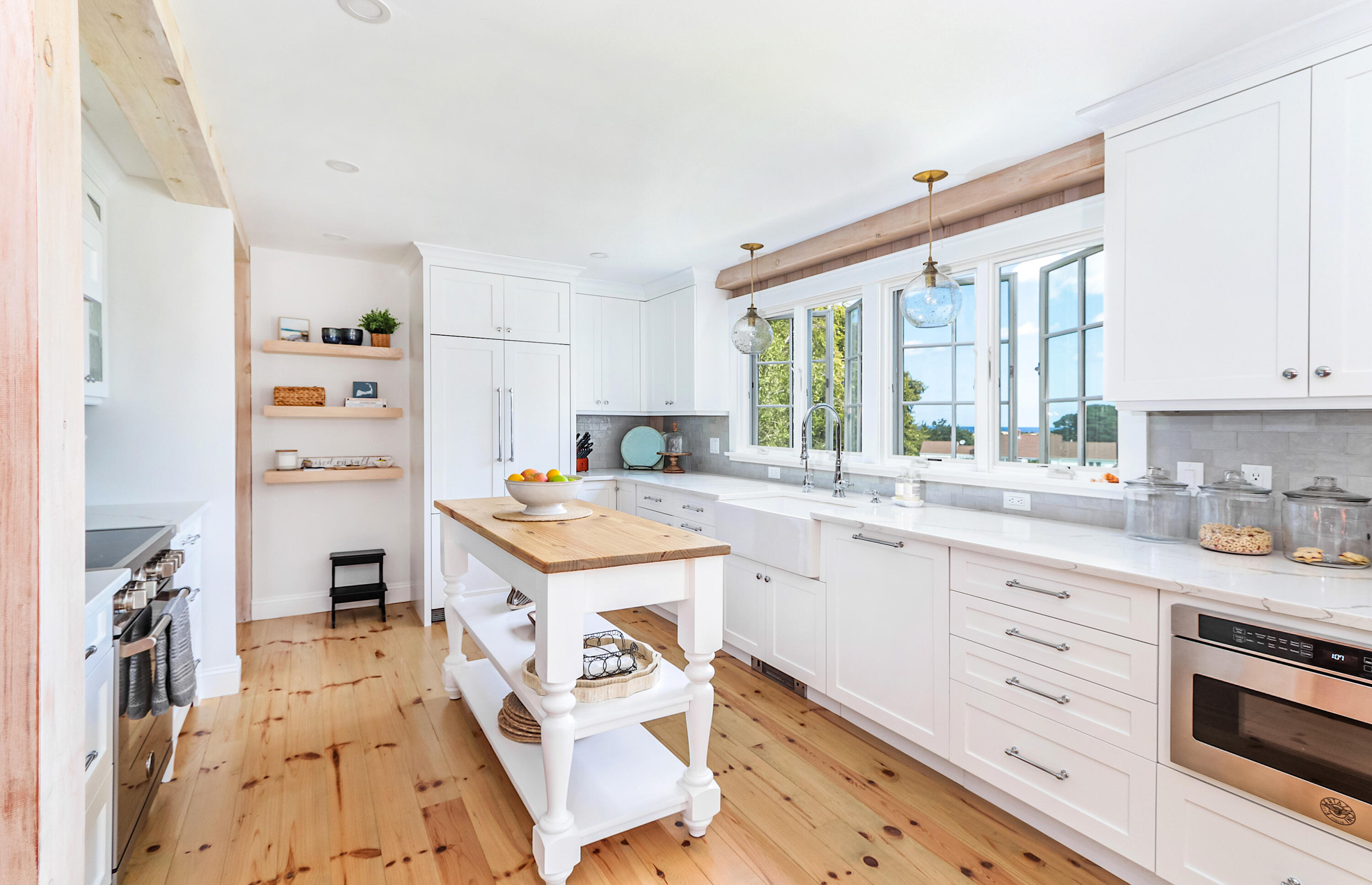 330 Sandy Neck Road West Barnstable, MA 02668 - Photo 7 of 45 a kitchen with granite countertop a sink appliances cabinets and furniture