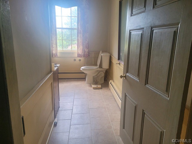 3922 Courtland Road Disputanta, VA 23842 - Photo 17 of 22 a bathroom with a toilet and a bathtub