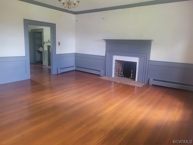 3922 Courtland Road Disputanta, VA 23842 - Photo 8 of 22 a view of an empty room with wooden floor and a window