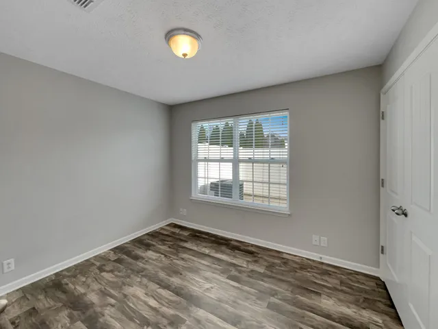 a bathroom with a sink vanity and a mirror