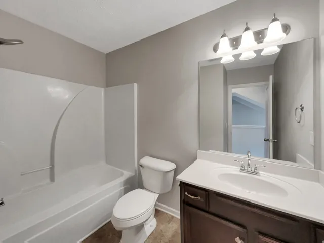 a view of an house with a garage