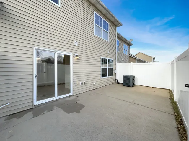 a view of a house with backyard