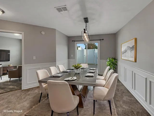 a view of a dining room with furniture