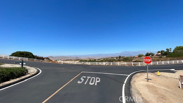 23771 Tapatia Road Homeland, CA 92548 - Photo 14 of 15 a view of a swimming pool and lake view