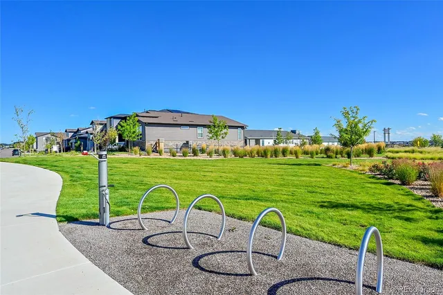 a view of a table and chairs in the garden