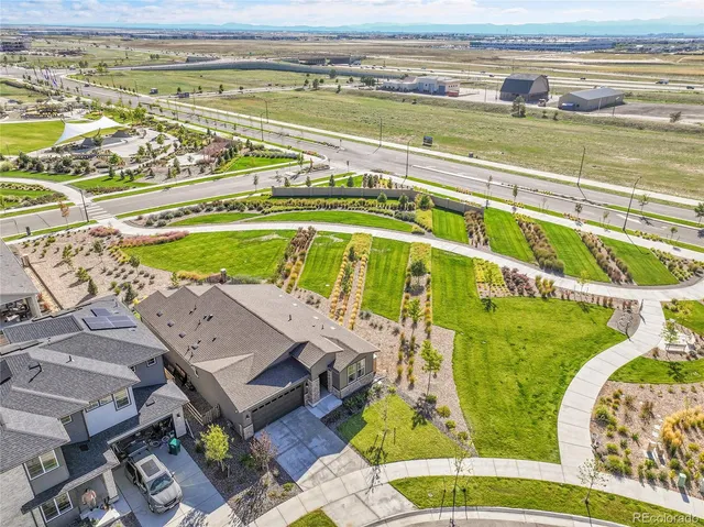 swimming pool with a table and chairs