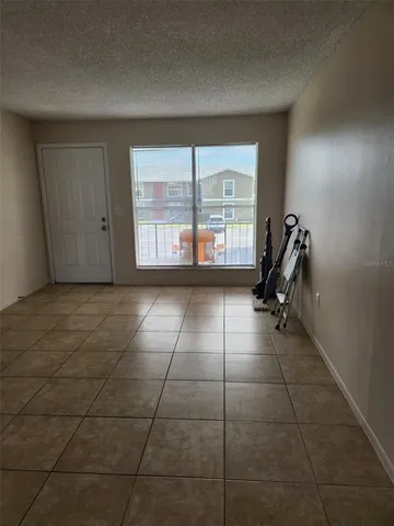 a view of a room with a window